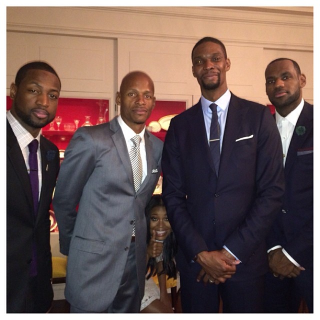 Gabby makes the perfect photobomb at the White House with the Miami Heat.