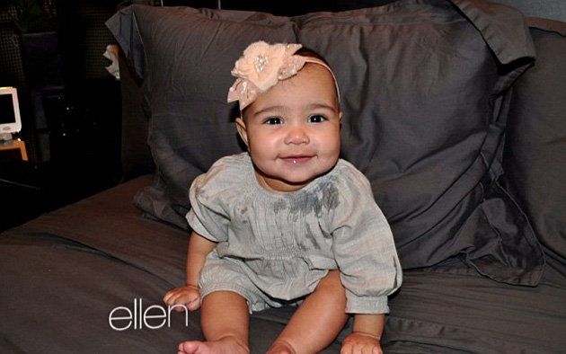 The Wests opened up the year with new pics of little North actually smiling.