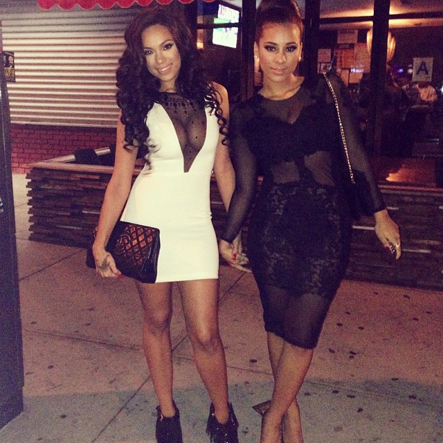 The Love & Hip Hop love birds hold hands.