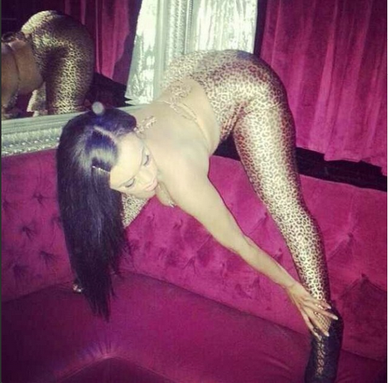 Cubana Lust is a model, stripper, owner of some mean curves.