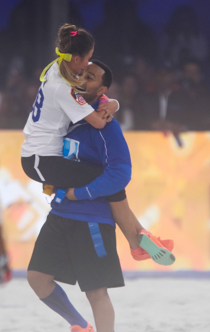 Chrissy Teigen and John Legend at Celebrity Bowl Match