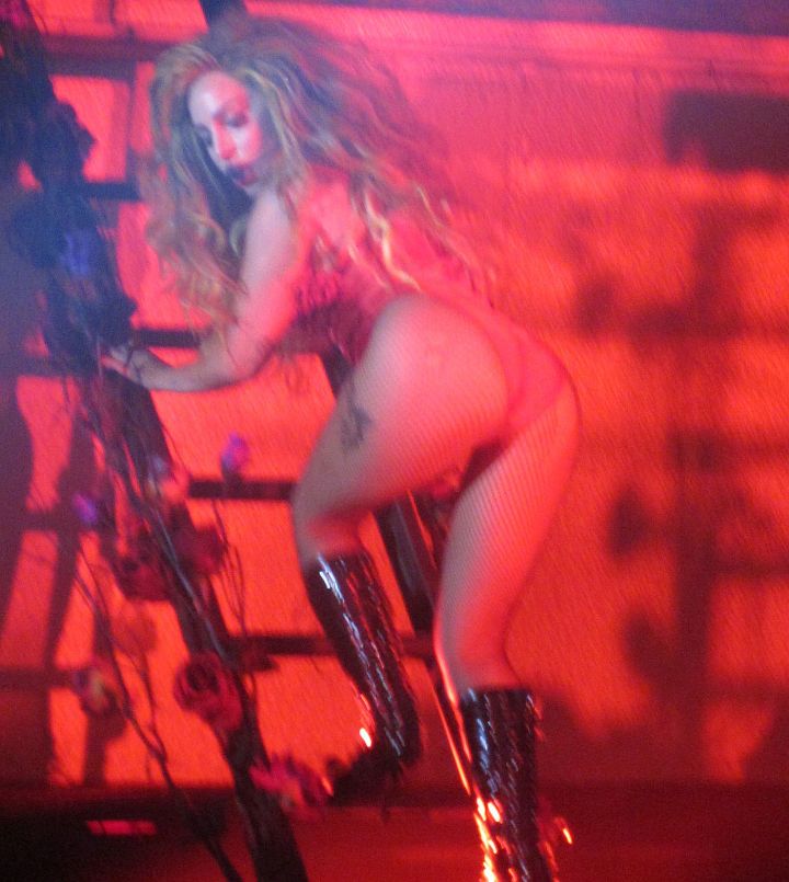 Bent Over In The Bodysuit.