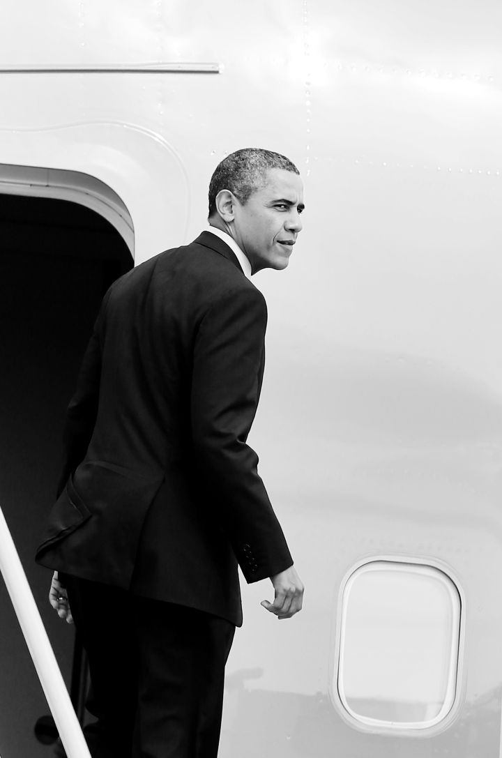 Obama giving face in a serious “we made it” pose.