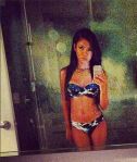 Jhene in a two piece.