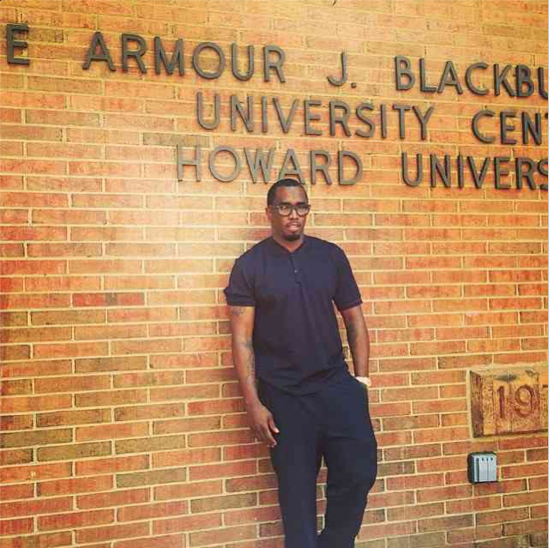 Diddy poses in front of Howard!