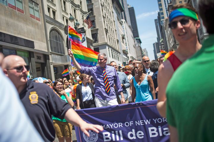NYC Mayor Bill de Blasio walks the lavender line in the Pride parade.