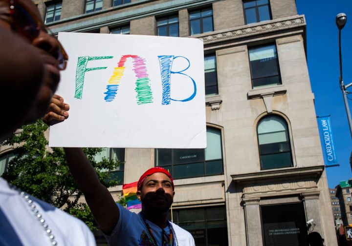 Pride parade winds through the streets of NYC.