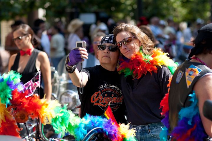 Parade-goers stop to take an ‘usie’ in San Francisco.