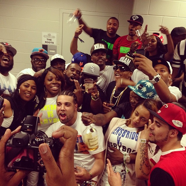 Nas posed with his Queens family backstage.