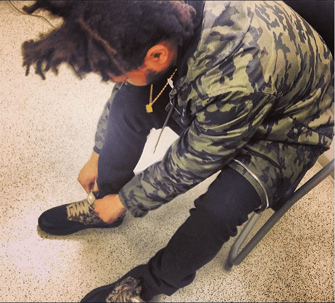 The Weeknd Ties His Own Shoes
