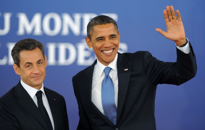 That guy should watch out, Obama’s smile is contagious!