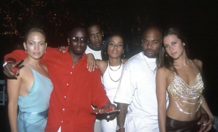 Aaliyah photoed chilling with Diddy, J.Lo, and Jay Z