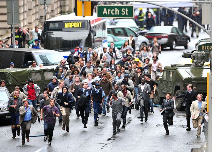 A crowd swarms the streets in the movie “World War Z.”