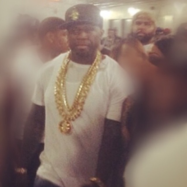 50 Cent. Stacks in the background.