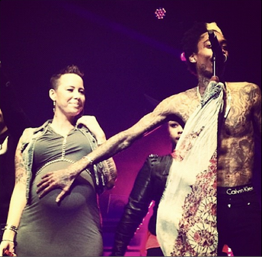 During a performance in his hometown of Pittsburgh, Wiz brought Amber on stage and proclaimed his love for his pregnant lover.