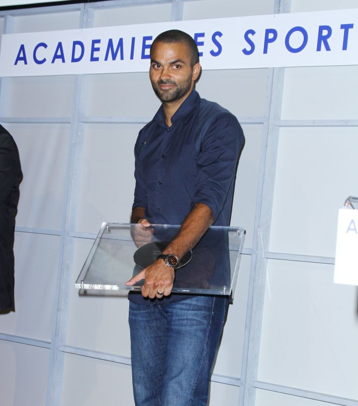 Tony Parker shows off his 2013 Sport Academy Award in Paris.
