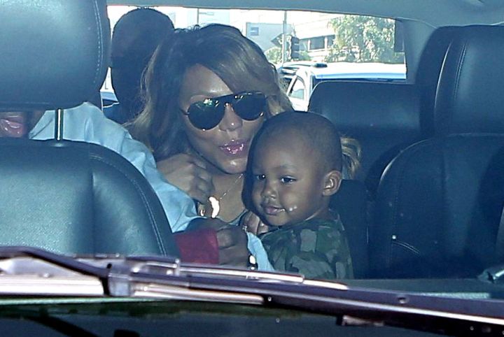 Tamar Braxton steals a smooch from her son Logan at LAX.
