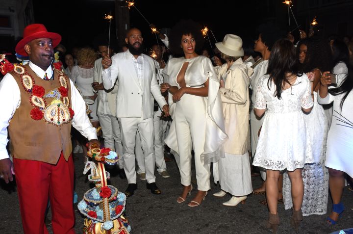 Solange and Alan Ferguson celebrate their big day on the streets of New Orleans.