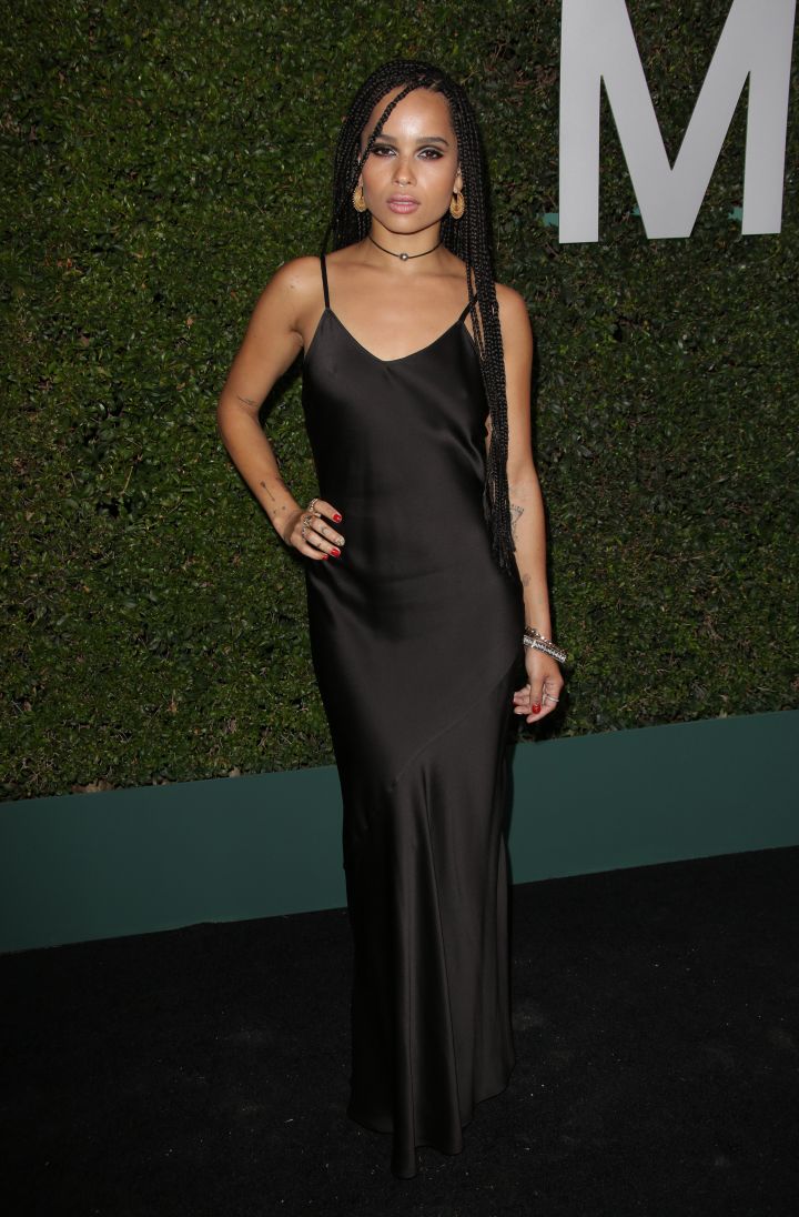 Zoe looks sleek and sophisticated and lets her long hair flourish in a black dress.