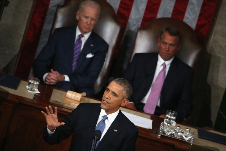 Obama begins his State of the Union speech, one of the shortest of his presidency.