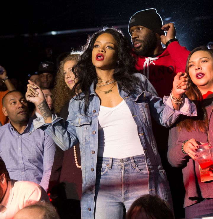 Rihanna dances while watching the main event.