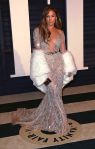 J.Lo stuns in another plunge-gown at the Oscars Vanity Fair After Party in 2015.