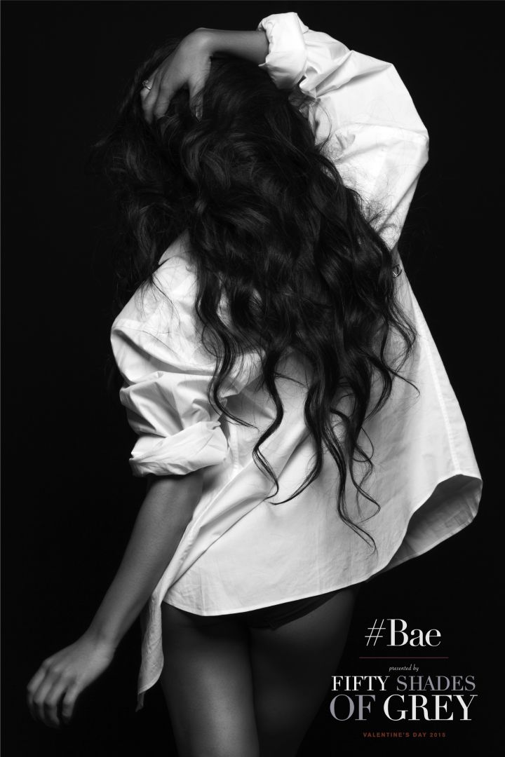 Then showed off her long tresses while giving us a peek at her behind.