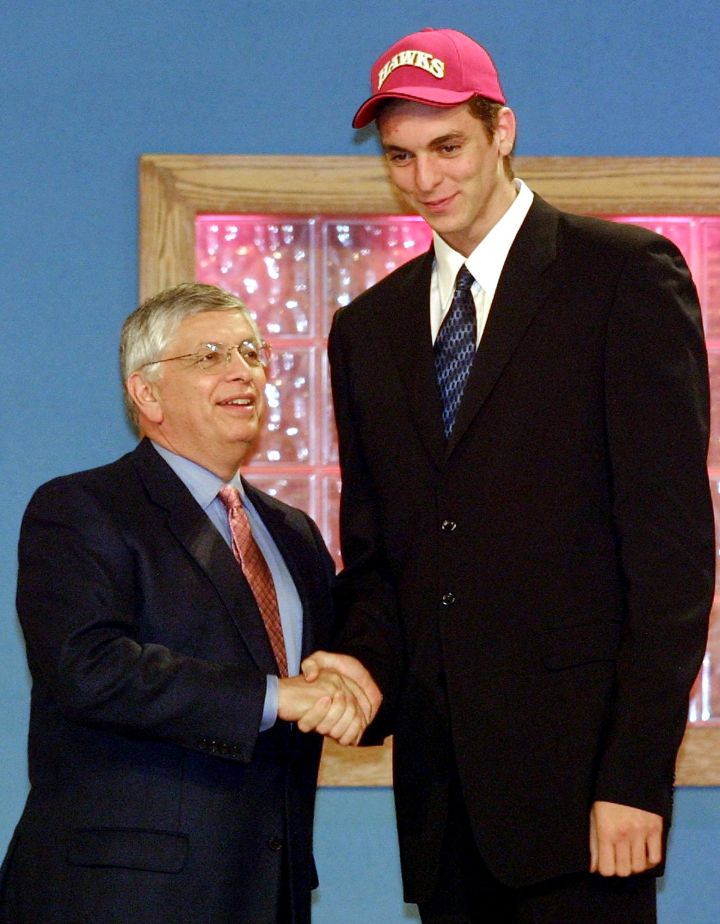 Pau Gasol congratulated by NBA Commissioner David Stern after being selected as the number three pick by the Atlanta Hawks in the 2001 NBA Draft.