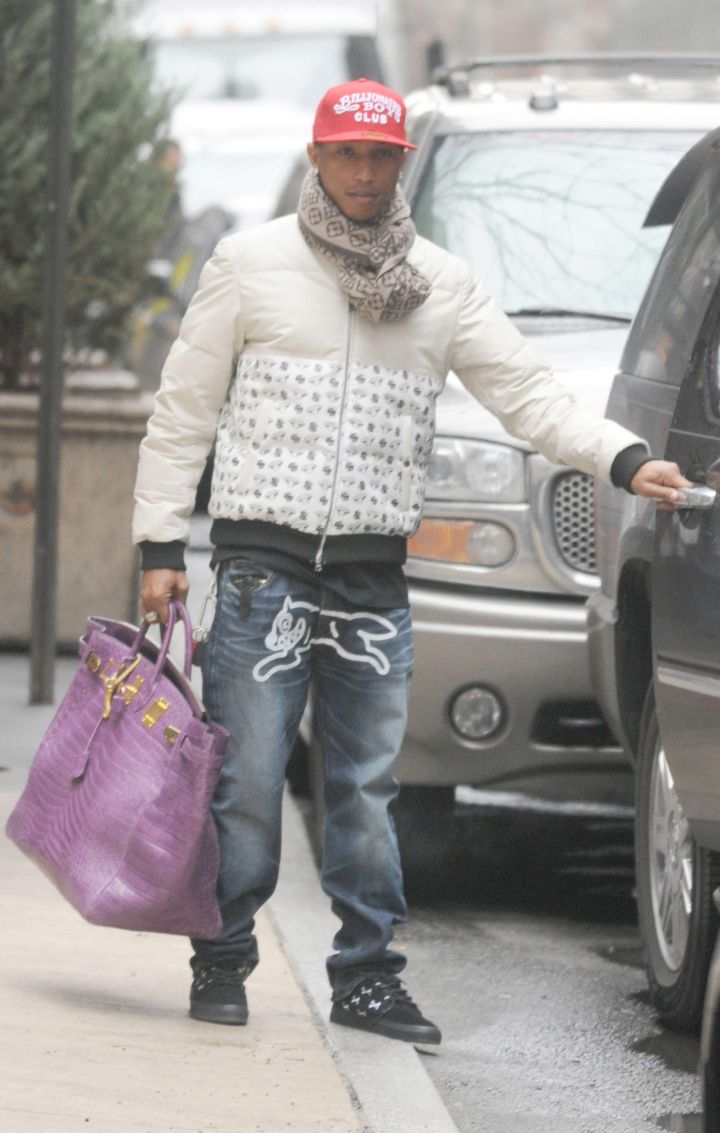 He dubbed this oversized, bright purple Hermes as his ātravel bag.ā