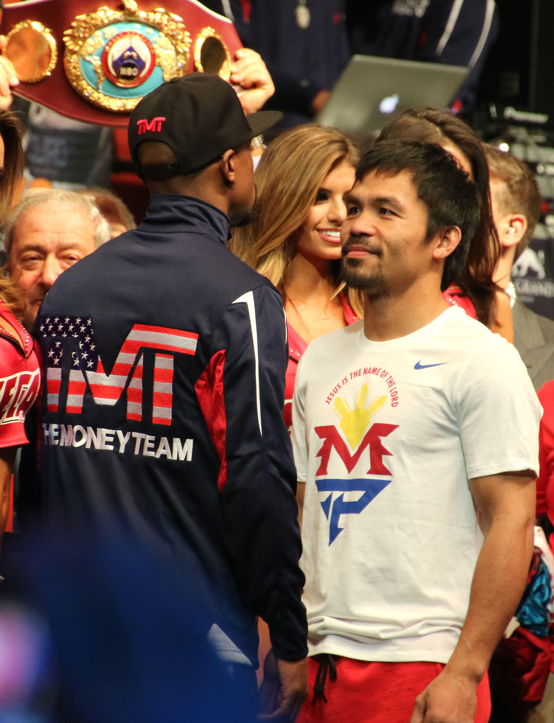 Mayweathe & Pacquaio face each other during the weigh-in 2015