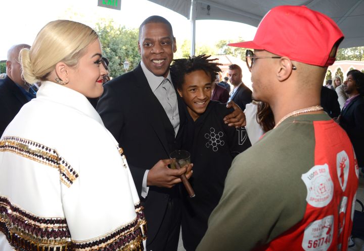 Jaden Smith being star struck by T.I. while hugging Jay Z.