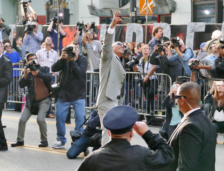 The Rock gave a big shout out to a fan up high as he was heading into the premiere of Warner Bros. Pictures’ ‘San Andreas’ at TCL Chinese Theatre in Hollywood, California.