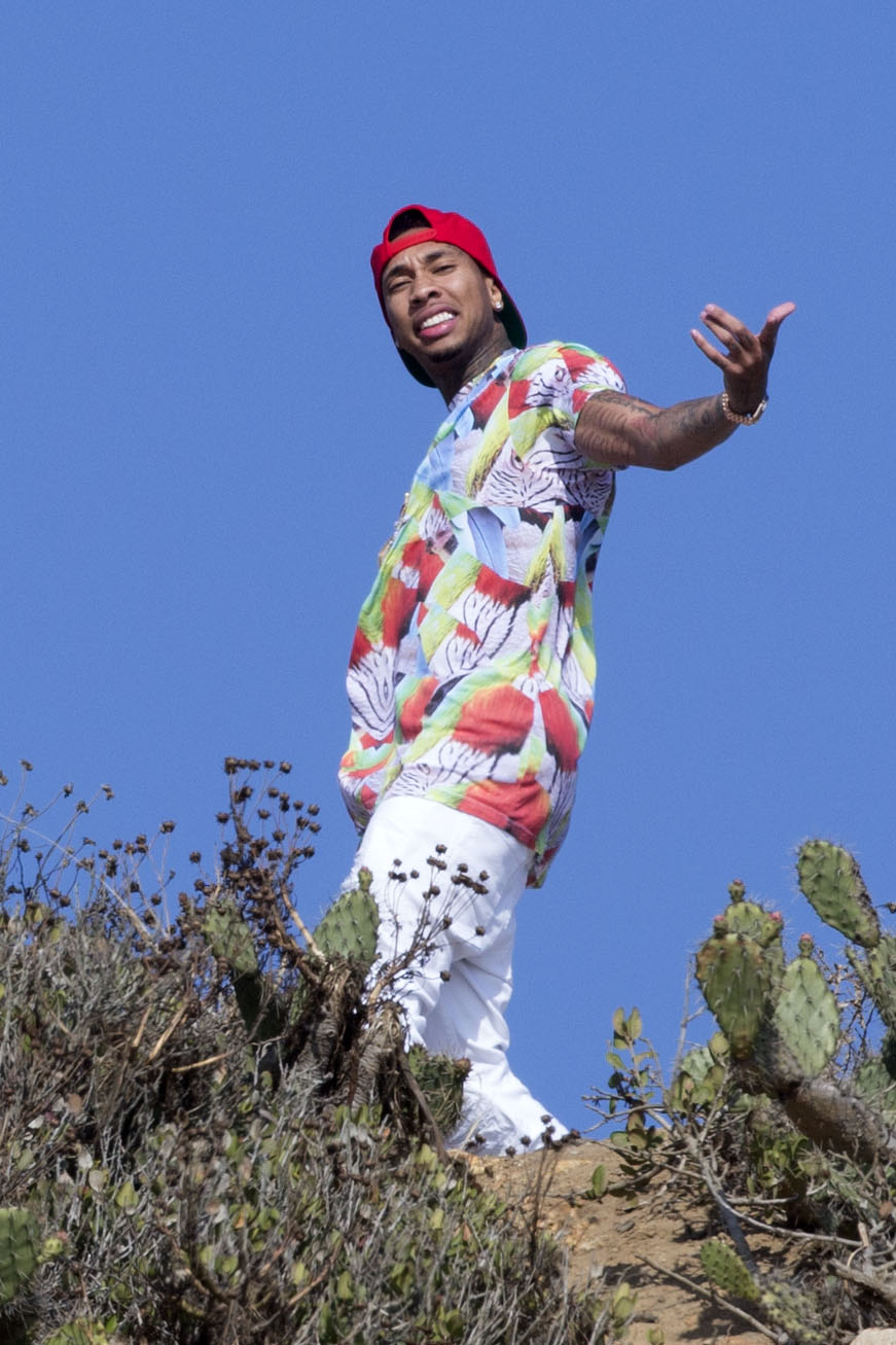 Tyga films on top of Zuma point for 'Do It Again' music video.