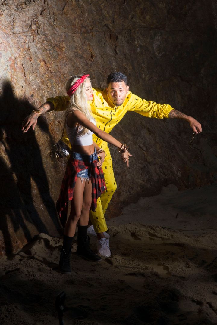 Chris Brown and Pia Mia dance around in the sand during their “Do It Again” music video shoot.