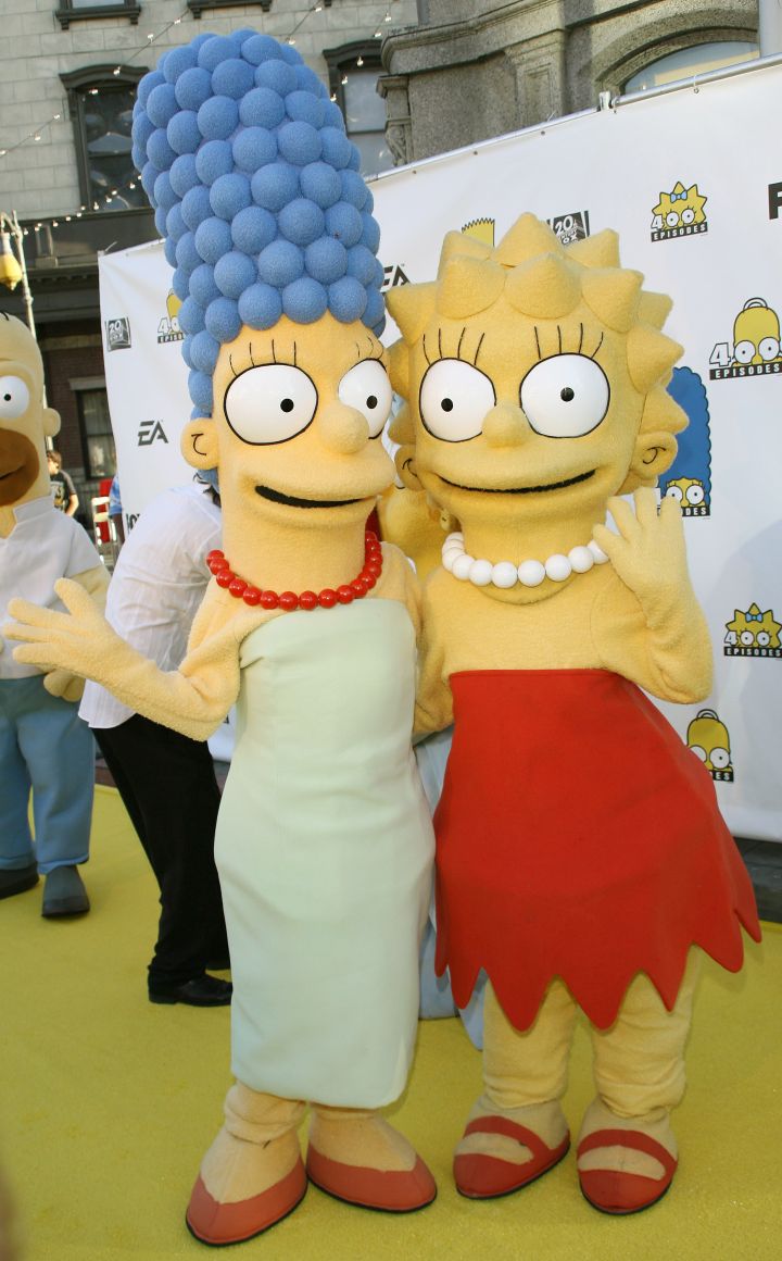 Marge Simpson has a kinky blue afro and Lisa sings the blues and plays the sax.