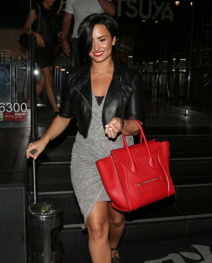 Demi Lovato puts her stunning body on full display in a curve-hugging dress.