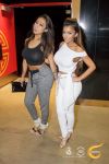 Angel Brinks shows off her amazing curves with a friend.