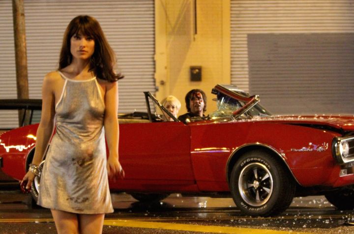 Olivia Wilde sports a fake baby bump while filming a disturbing scene for HBO series “Vinyl.”