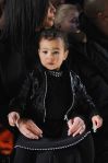 Front row at Fashion Week in all black everything, just like dad.