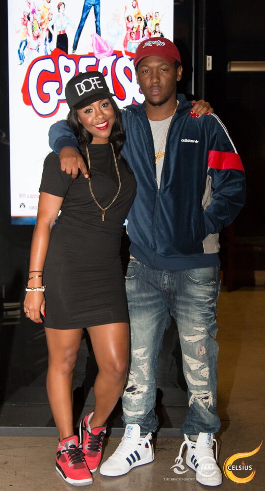 Miss Diddy and Hit-Boy smile for the photogs.