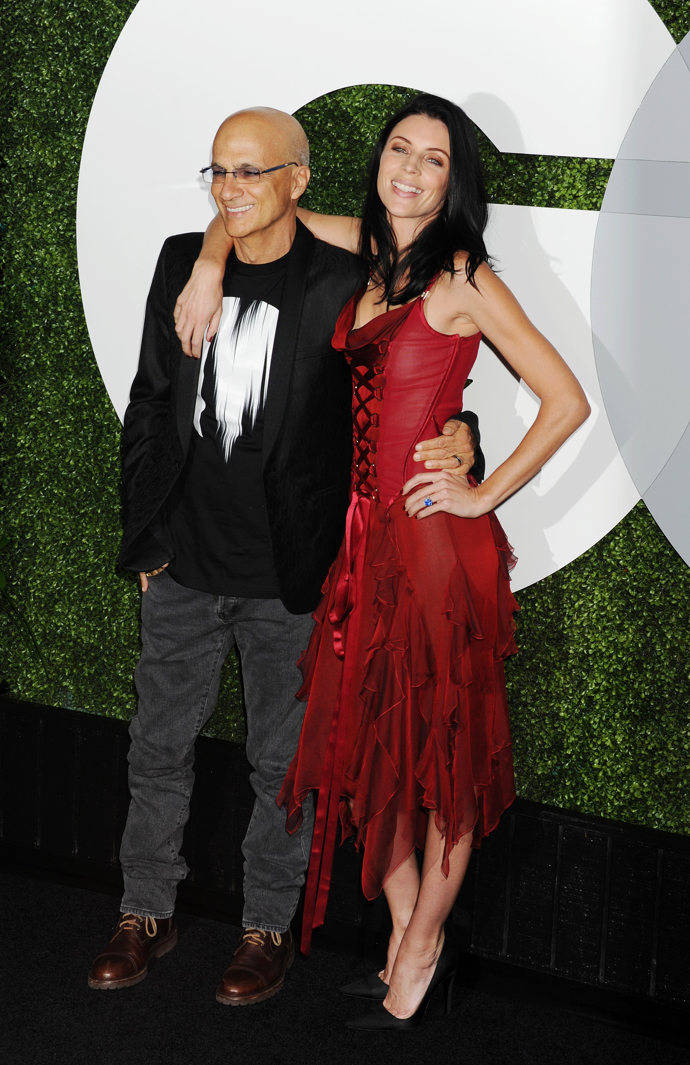 Beats co-founder Jimmy Iovine (L) and model Liberty Ross arrive at the 2014 GQ Men Of The Year Party at Chateau Marmont on December 4, 2014 in Los Angeles, California.