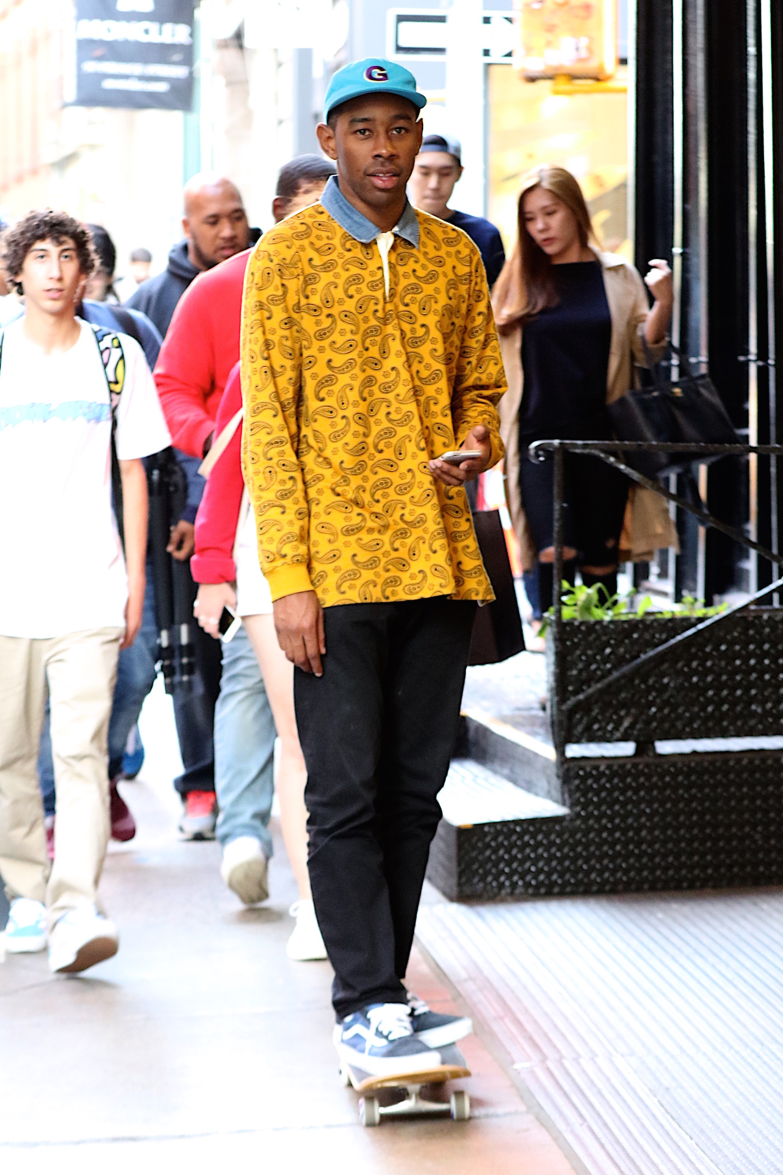 Tyler, the Creator was spotted skateboarding on the busy NYC sidewalks in Soho.