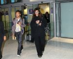 Rihanna and her little brother arrived in Paris at Charles de Gaulle airport just in time to attend Paris Fashion Week.
