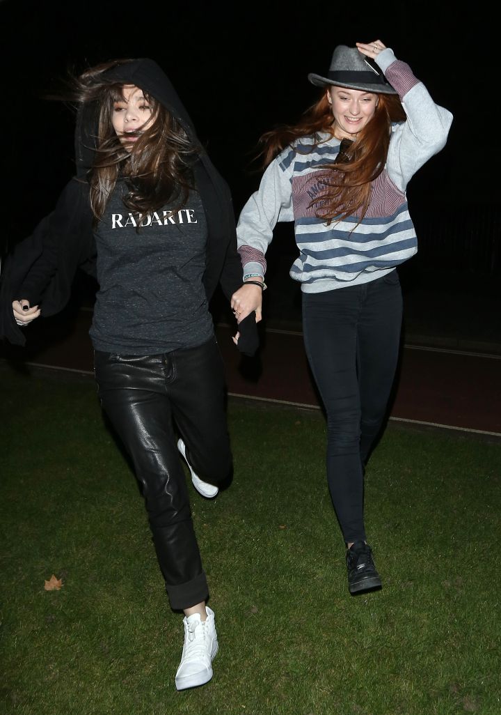So cool. “Game Of Thrones” star Sophie Turner and pal Hailee Steinfeld run out to meet fans in London’s Hyde Park. They signed autographs and posed for pictures with fans.