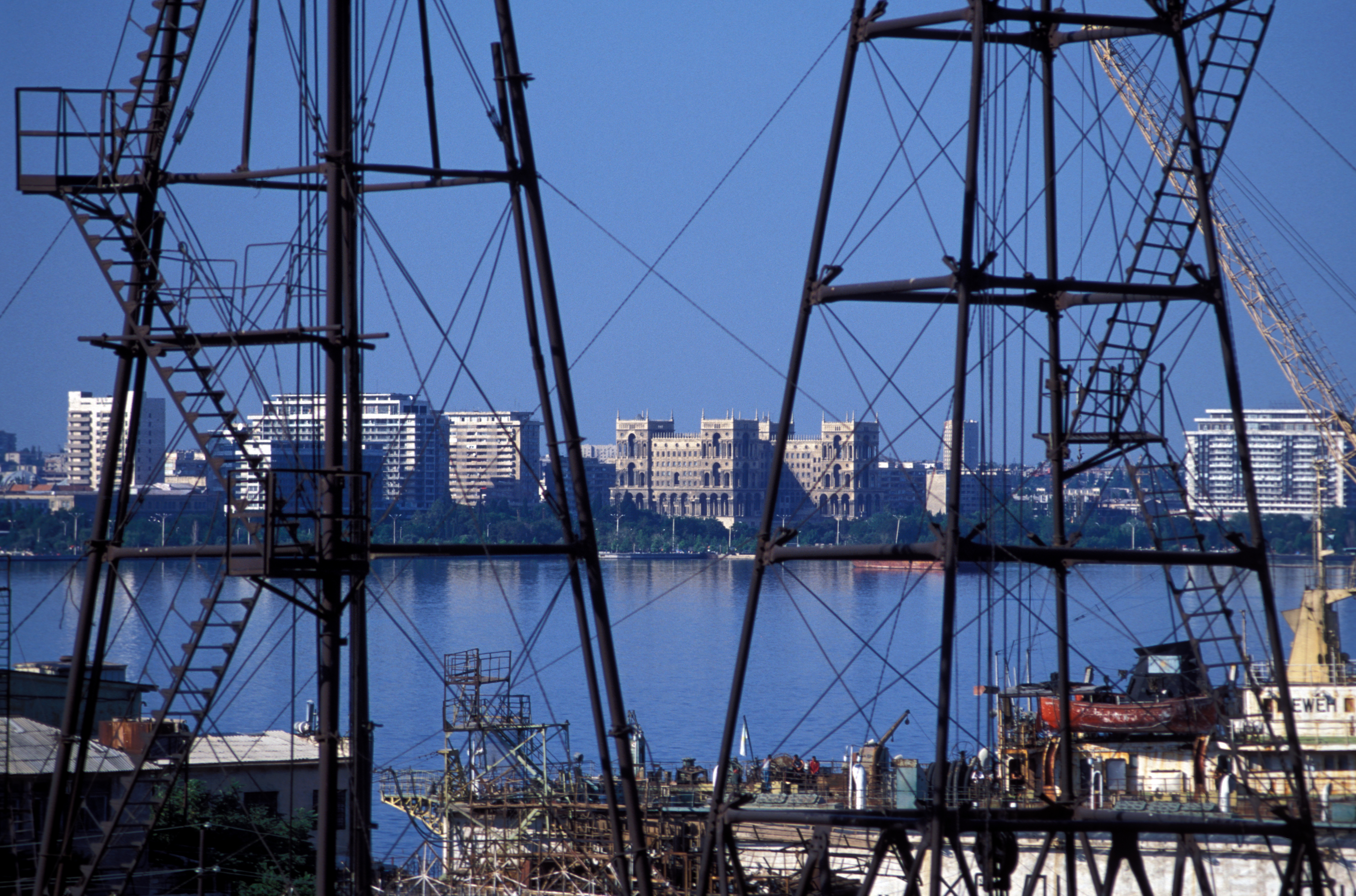 Oil rigs and view of Baku over the Caspian Sea...