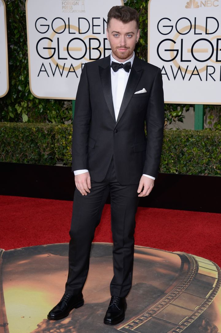 Sam Smith suited up in style for the big occasion.