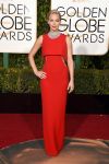 Jennifer Lawrence’s striking red gown hugged her figure in all the right places.