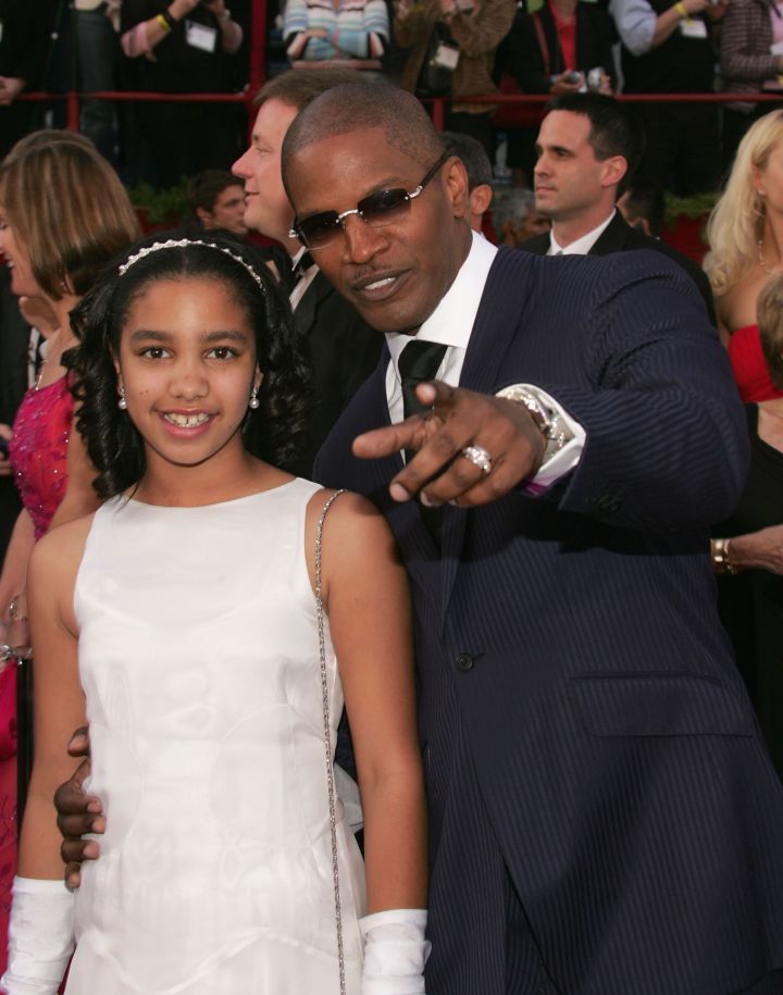Point to the camera, Jamie. Jamie Foxx was nominated for Best Actor in a Supporting Role for his performance in ‘Collateral’ and for Best Actor in a Leading Role for his performance in ‘Ray’ and arrives at the Oscars with his daughter Corinne.