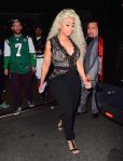 Blac Chyna steps out in a semi-sheer black jumpsuit.