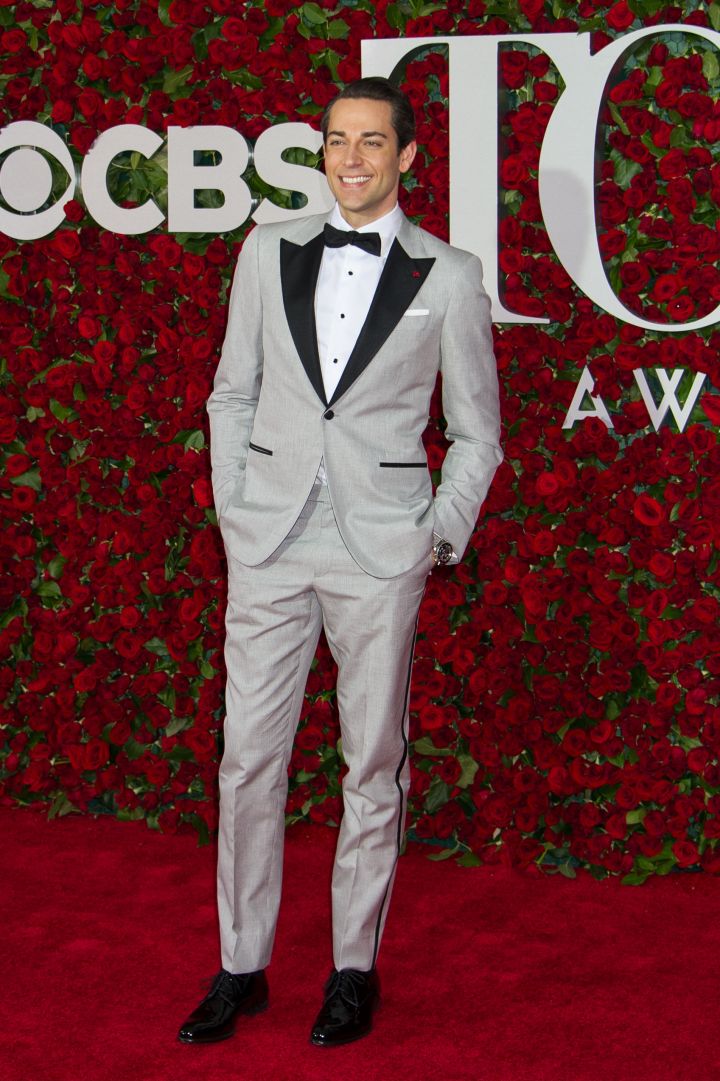Actor Zachary Levi in a gray suit.
